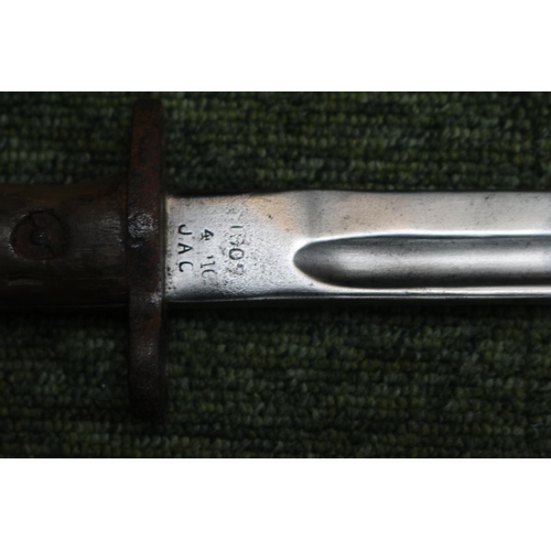 353 - 1909 Pattern Bayonet marked JAC 1909 with Military arrow marks. 55cm in Length