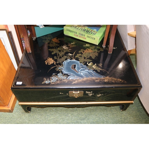 549 - Lacquered Japanese style hinged top coffee table on bracket feet