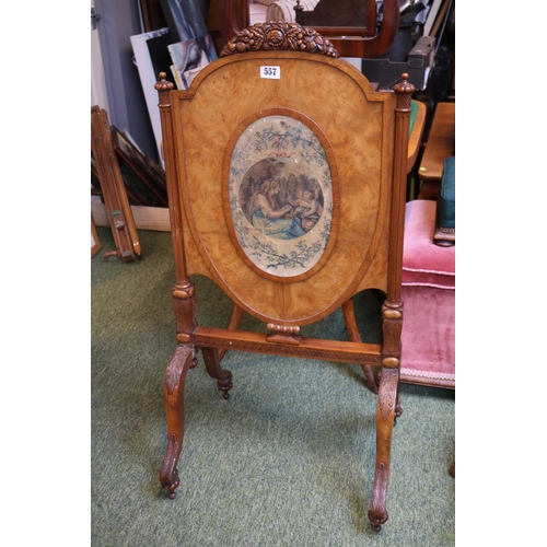 557 - 19thC French Walnut Adjustable Fire screen with original silk insert and carved surmounted floral de... 