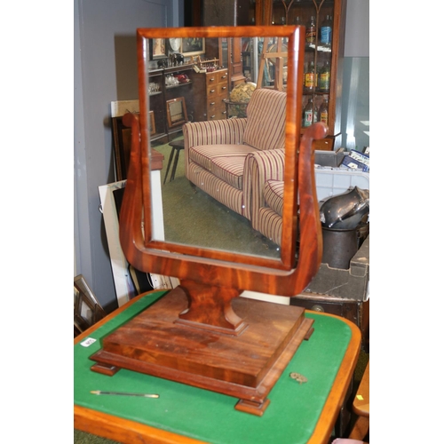 558 - William IV Mahogany swing mirror on Lyre support over square stepped base