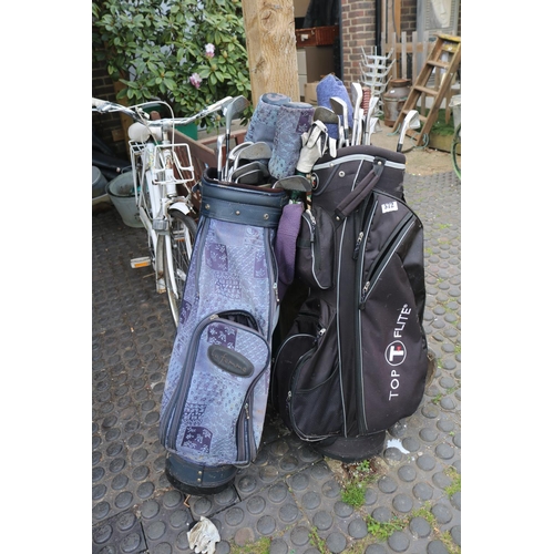 572 - 2 Bags of assorted Golf Clubs