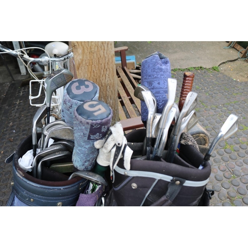 572 - 2 Bags of assorted Golf Clubs