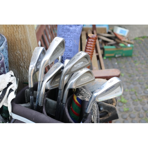 572 - 2 Bags of assorted Golf Clubs