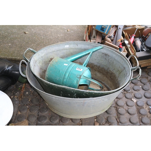 574 - 2 Galvanised wash tubs and a Watering Can