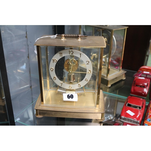 60 - Kieninger & Obergfell Electric clock with numeral face and brass case