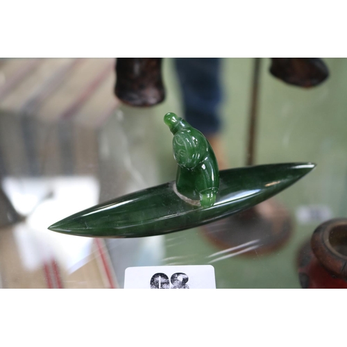 98 - Nephrite Jade Inuit figure of a man in Canoe