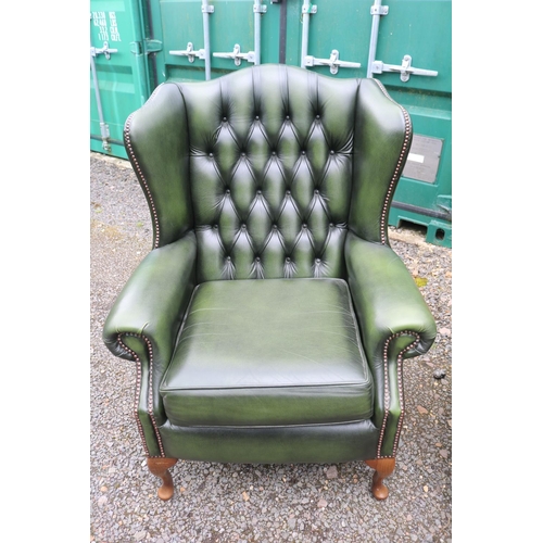 418 - Green Leather Chesterfield Wing arm sofa suite comprising of 3 seater sofa and matching armchairs on... 