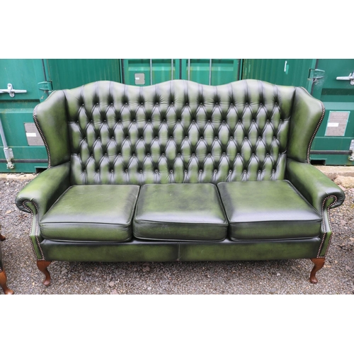 418 - Green Leather Chesterfield Wing arm sofa suite comprising of 3 seater sofa and matching armchairs on... 