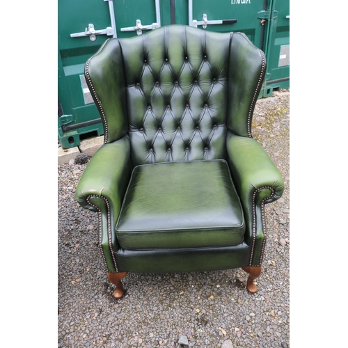 418 - Green Leather Chesterfield Wing arm sofa suite comprising of 3 seater sofa and matching armchairs on... 