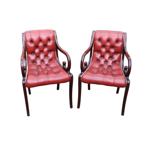 420 - Pair of 20thC Chesterfield Button back Red Leather studded Elbow chairs with scroll arms