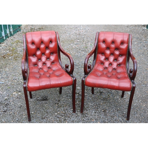 420 - Pair of 20thC Chesterfield Button back Red Leather studded Elbow chairs with scroll arms