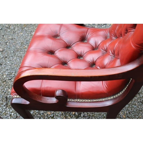 420 - Pair of 20thC Chesterfield Button back Red Leather studded Elbow chairs with scroll arms