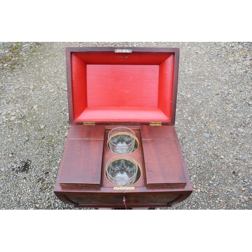 423 - William IV Mahogany Rosewood Veneered Teapoy with fitted interior sup-ported on trefoil base. 43cm i... 