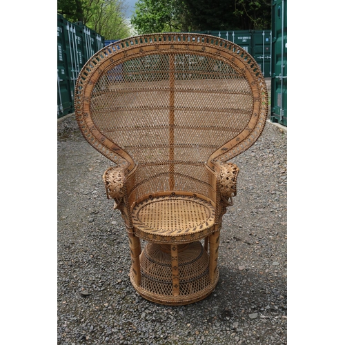 425 - 1970s Cane Peacock elbow chair possibly Italian. 108cm in Width by 148cm in Height