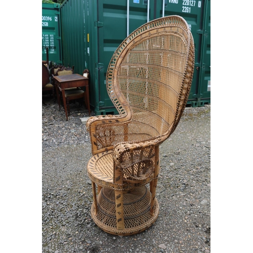 425 - 1970s Cane Peacock elbow chair possibly Italian. 108cm in Width by 148cm in Height