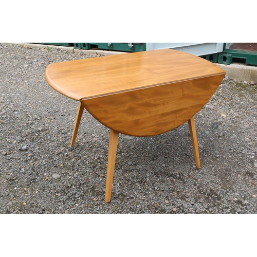 432 - Ercol Blonde Elm Dropleaf Oval dining table on splayed legs. 124cm in Length