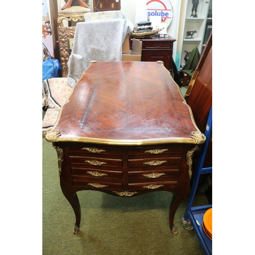 441 - 19thC Kingwood Partners Bombe Desk Louis XV Style with applied brass decoration. 134cm in Length by ... 