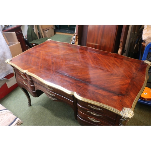 441 - 19thC Kingwood Partners Bombe Desk Louis XV Style with applied brass decoration. 134cm in Length by ... 