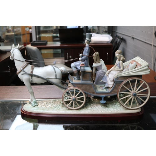 144 - Lladro The Landau Carriage Retired 1998 No. 1521, Sculpted by Juan Huerta. 53cm x 30cm with Plinth. ... 