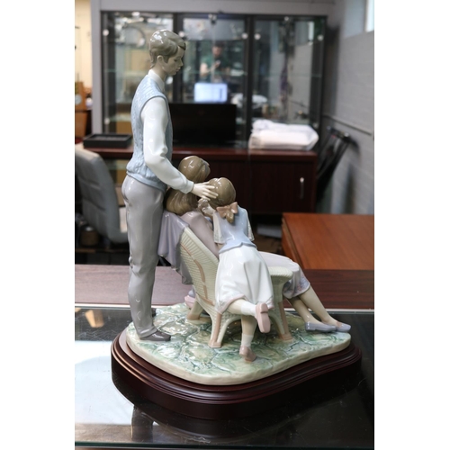 145 - Lladro Portrait of a Family Retired 2010 No. 1805, Sculpted by Francisco Polope. 42 x 31cm inc Plint... 