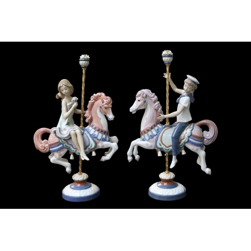 146 - Lladro Carousel Horses 1469 & 1470 Boy and Girl Retired 2000. Sculpted by Jose Puche. 39cm in Height