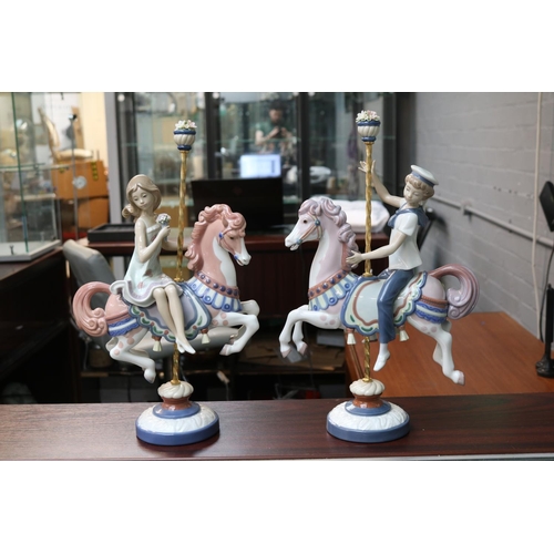 146 - Lladro Carousel Horses 1469 & 1470 Boy and Girl Retired 2000. Sculpted by Jose Puche. 39cm in Height