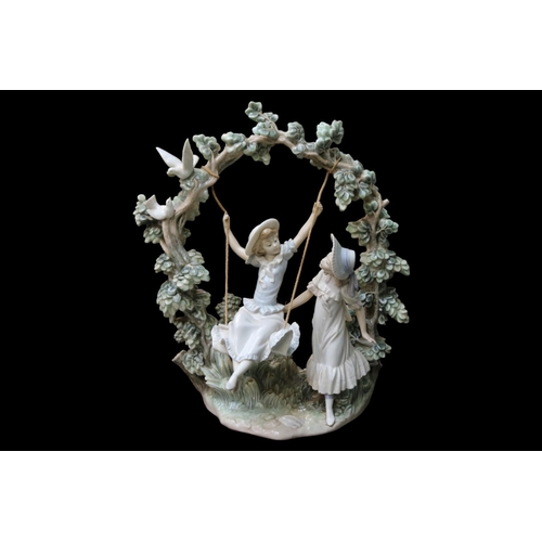 151 - Lladro Girls in a See Saw/Swing No.1366, Sculpted by Salvador Debon. 37cm in Height