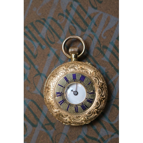 347e - 18K Ladies Pocket watch with Roman Numeral Dial 38g total weight with movement. 35mm in Diameter