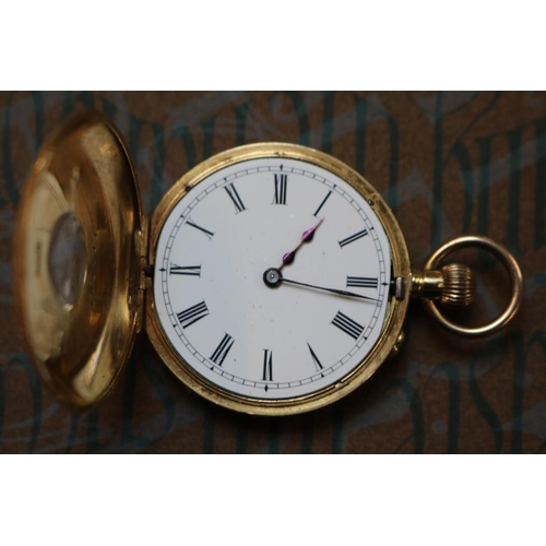 347e - 18K Ladies Pocket watch with Roman Numeral Dial 38g total weight with movement. 35mm in Diameter