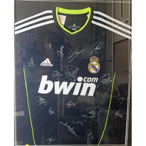 1 - Real Madrid 2010-11 Framed Shirt Signed by the Squad. Signatures on an ADIDAS Real Madrid 2010-11 fr... 