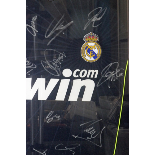 1 - Real Madrid 2010-11 Framed Shirt Signed by the Squad. Signatures on an ADIDAS Real Madrid 2010-11 fr... 