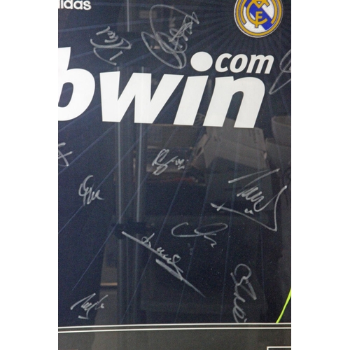 1 - Real Madrid 2010-11 Framed Shirt Signed by the Squad. Signatures on an ADIDAS Real Madrid 2010-11 fr... 