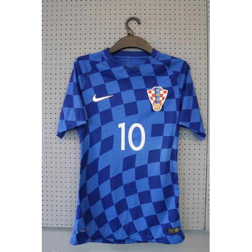 53 - LUKA MODRIC 2016 MATCH WORN #10 CROATIA JERSEY
The Nike brand blue shirt sleeve was worn by Luka Mod... 