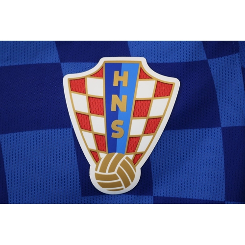 53 - LUKA MODRIC 2016 MATCH WORN #10 CROATIA JERSEY
The Nike brand blue shirt sleeve was worn by Luka Mod... 