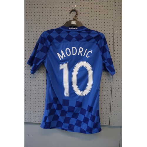 53 - LUKA MODRIC 2016 MATCH WORN #10 CROATIA JERSEY
The Nike brand blue shirt sleeve was worn by Luka Mod... 