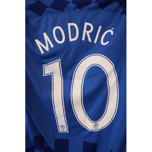 53 - LUKA MODRIC 2016 MATCH WORN #10 CROATIA JERSEY
The Nike brand blue shirt sleeve was worn by Luka Mod... 