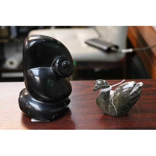 118 - Obsidian African tribal model of an Elephant and a carved figure of a Swan