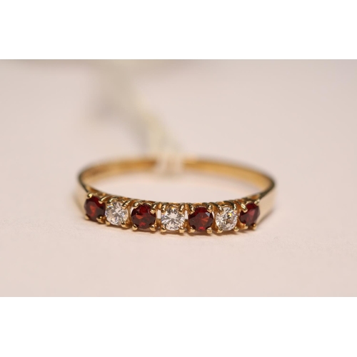 406 - Ladies 9ct Gold CZ and Ruby Set ring Size P. 1.2g total weight