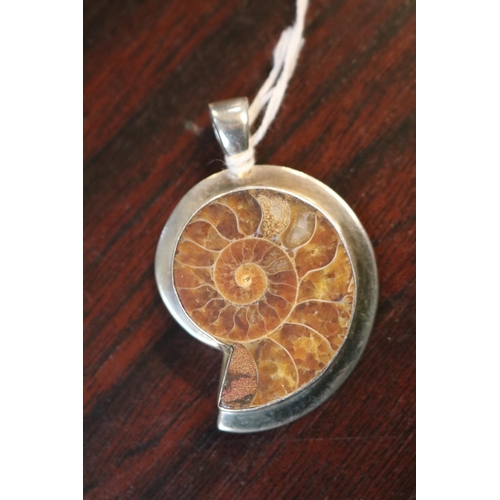 450 - Silver mounted Shell fossil pendant