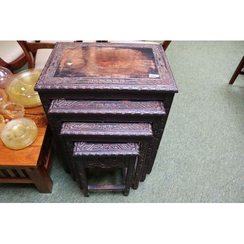 469 - Nest of 4 Chinese Carved Coffee tables with figural and prunus decoration