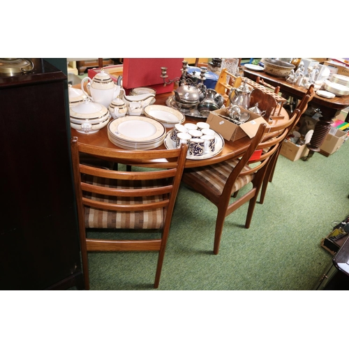 478 - G-Plan Mid Century Oval dining table with cantilever leaf and 6 Matching Chairs with paper labels. 1... 