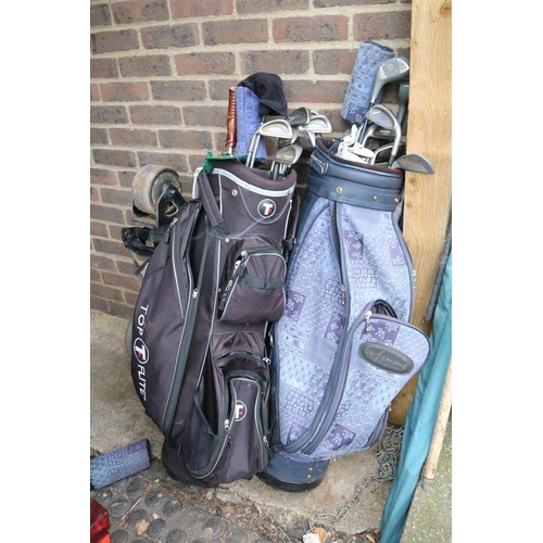 529 - 2 Bags of Golf clubs and a Electric Golf Caddy