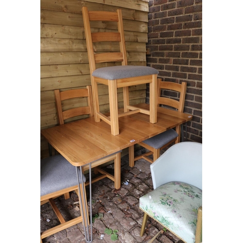 546 - French Oak dining table on metal legs and a set of 4 chairs with upholstered seats