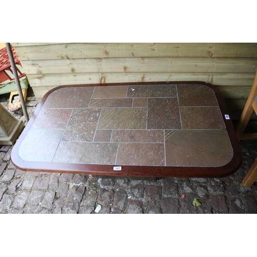 547 - Tile topped coffee table on wooden base