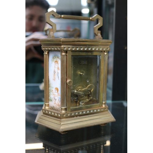 62 - Late 19thC French Carriage clock with hand painted ceramic panels of 6 sides, numeral dial and brass... 