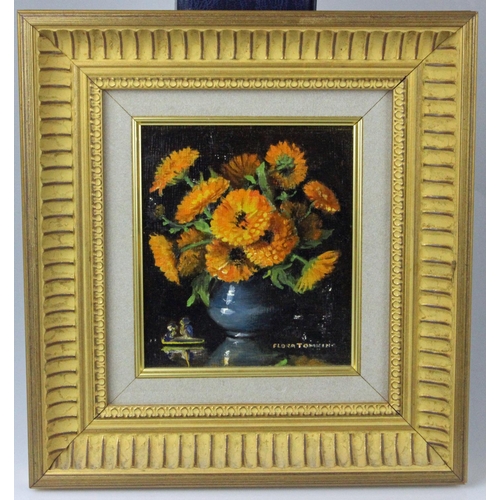 446 - Flora Tomkins (1872 - 1960) oil on board of orange flowers in a blue vase - gilt frame - 23cm x 24cm