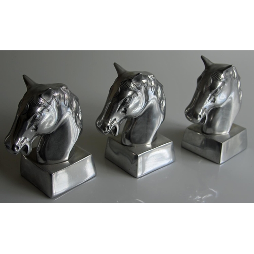 452 - Three Silvered Horses Head Sculptures