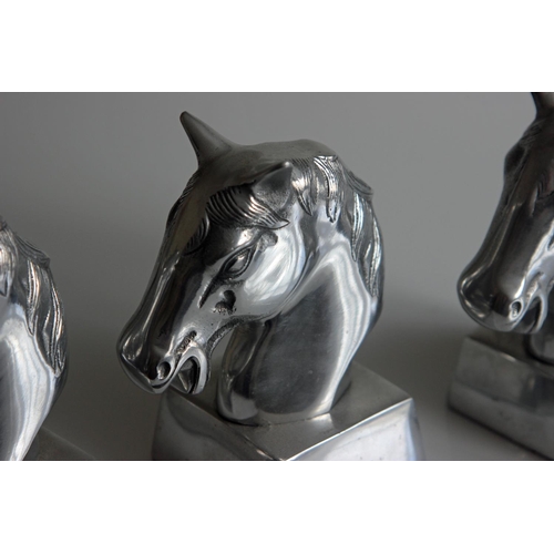 452 - Three Silvered Horses Head Sculptures