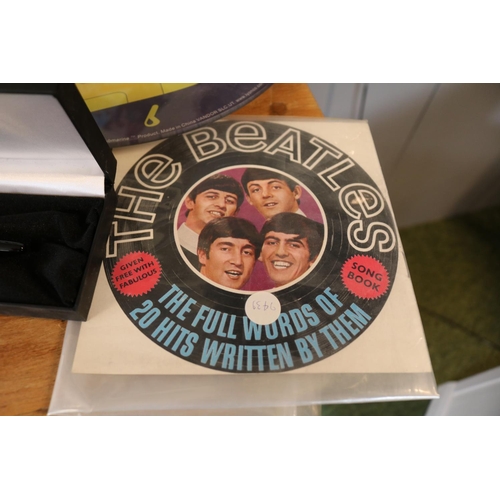 148 - Collection of assorted Period and later Beatles collectables items to inc song book, pen clock etc &... 