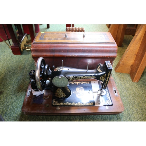 237 - Walnut cased Vintage Sewing machine